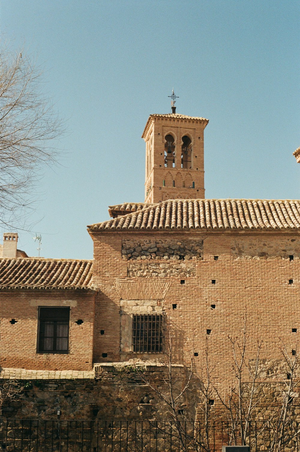 a tall brick building with a clock tower