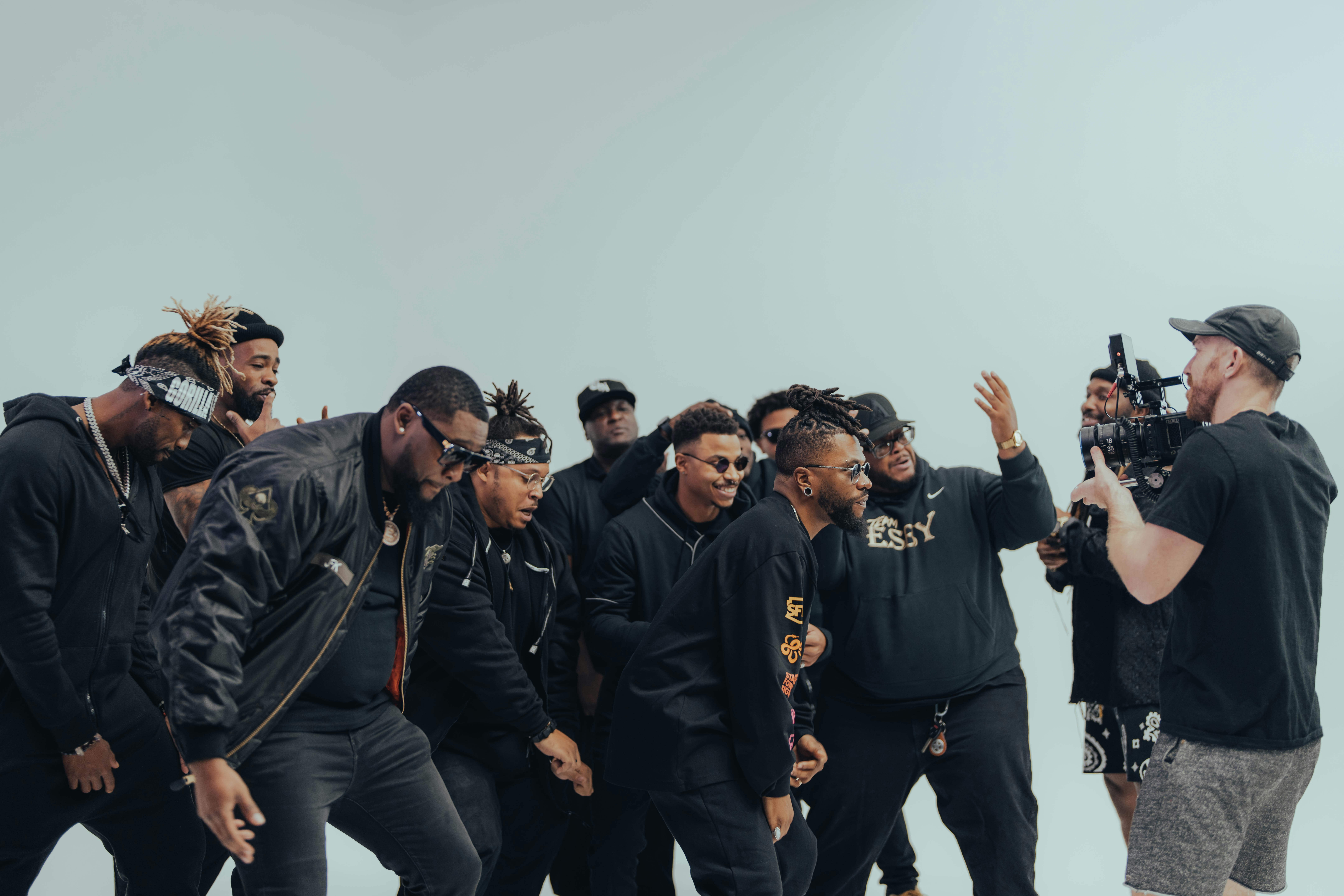 a group of young men standing next to each other