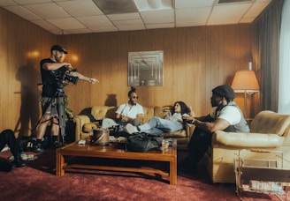 A video crew filming a stylish co-living space with vibrant lifestyle scenes.