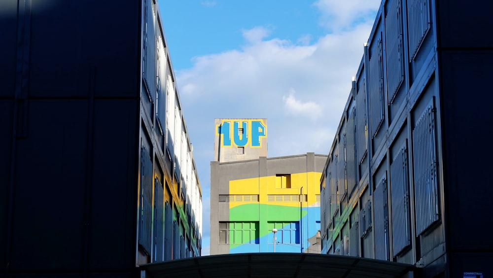 a view of the top of a building from between two buildings