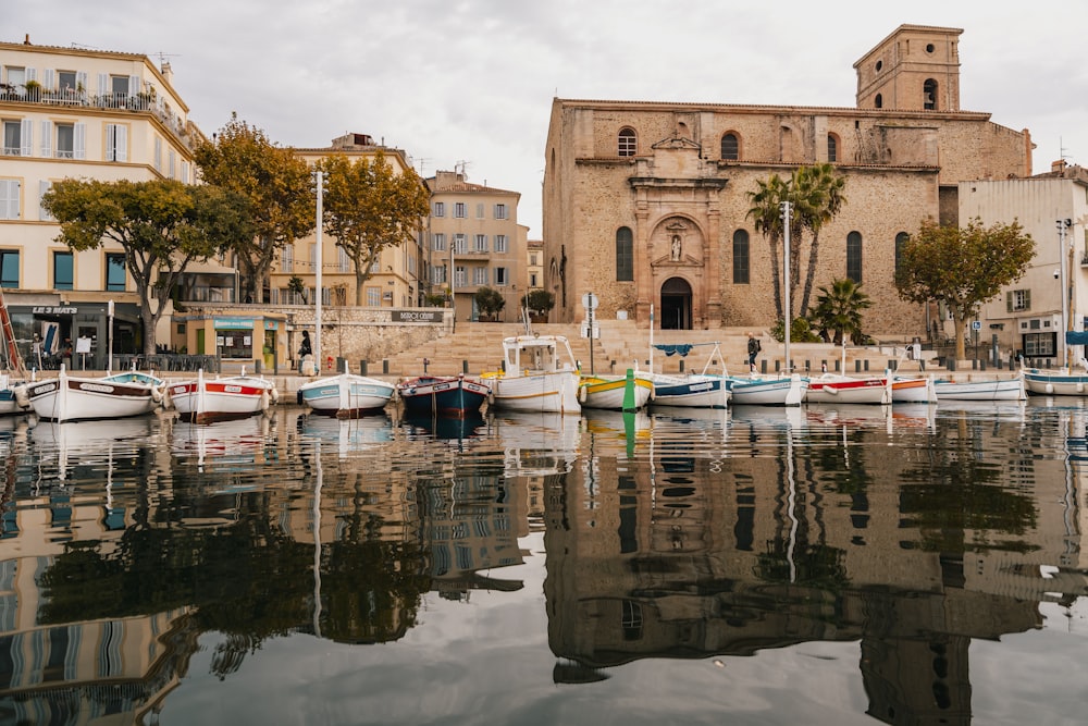 a bunch of boats that are sitting in the water