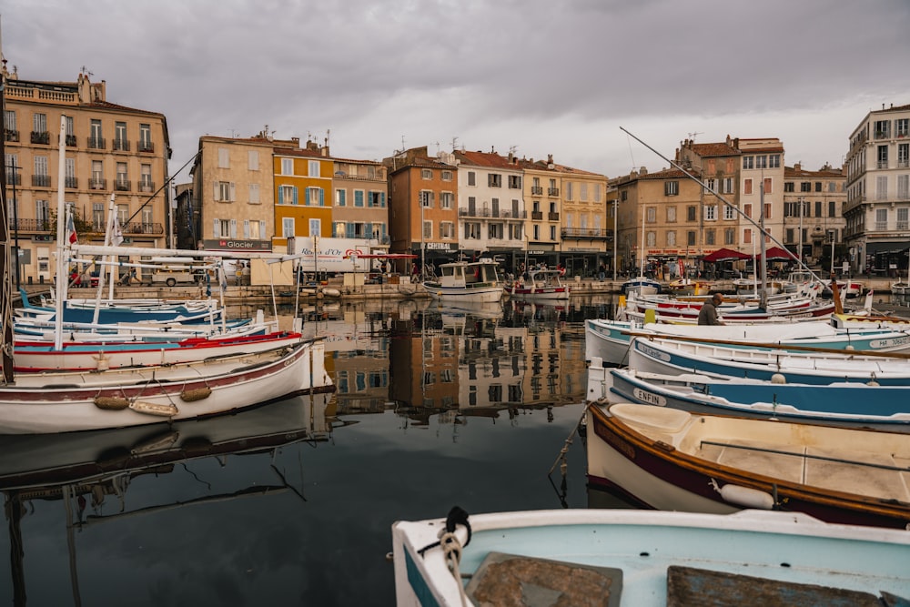 a group of boats that are sitting in the water