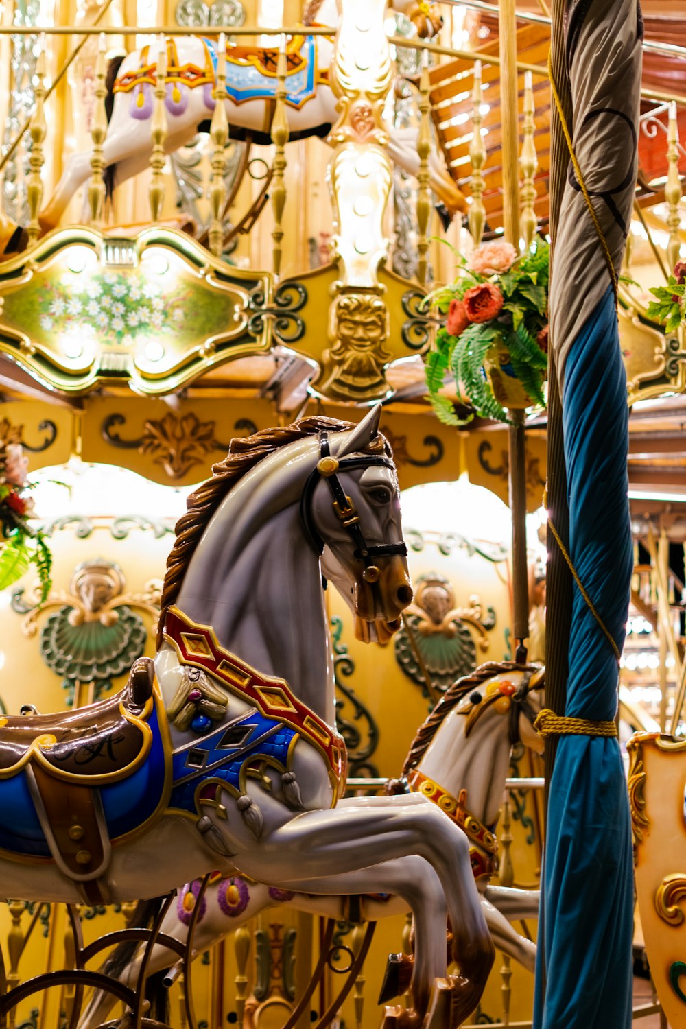 a carousel with a horse on top of it