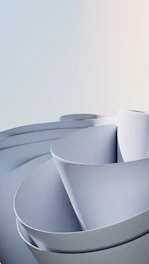 a group of white bowls sitting on top of a table