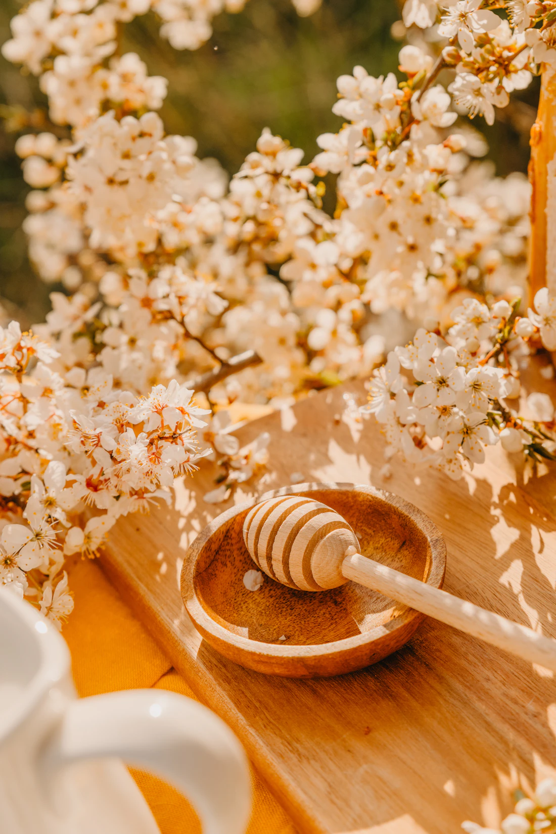 Wooden honey dipper representing buyer-specific presentation