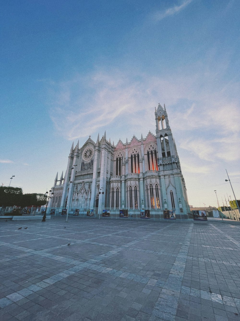 a large cathedral with a clock on the front of it