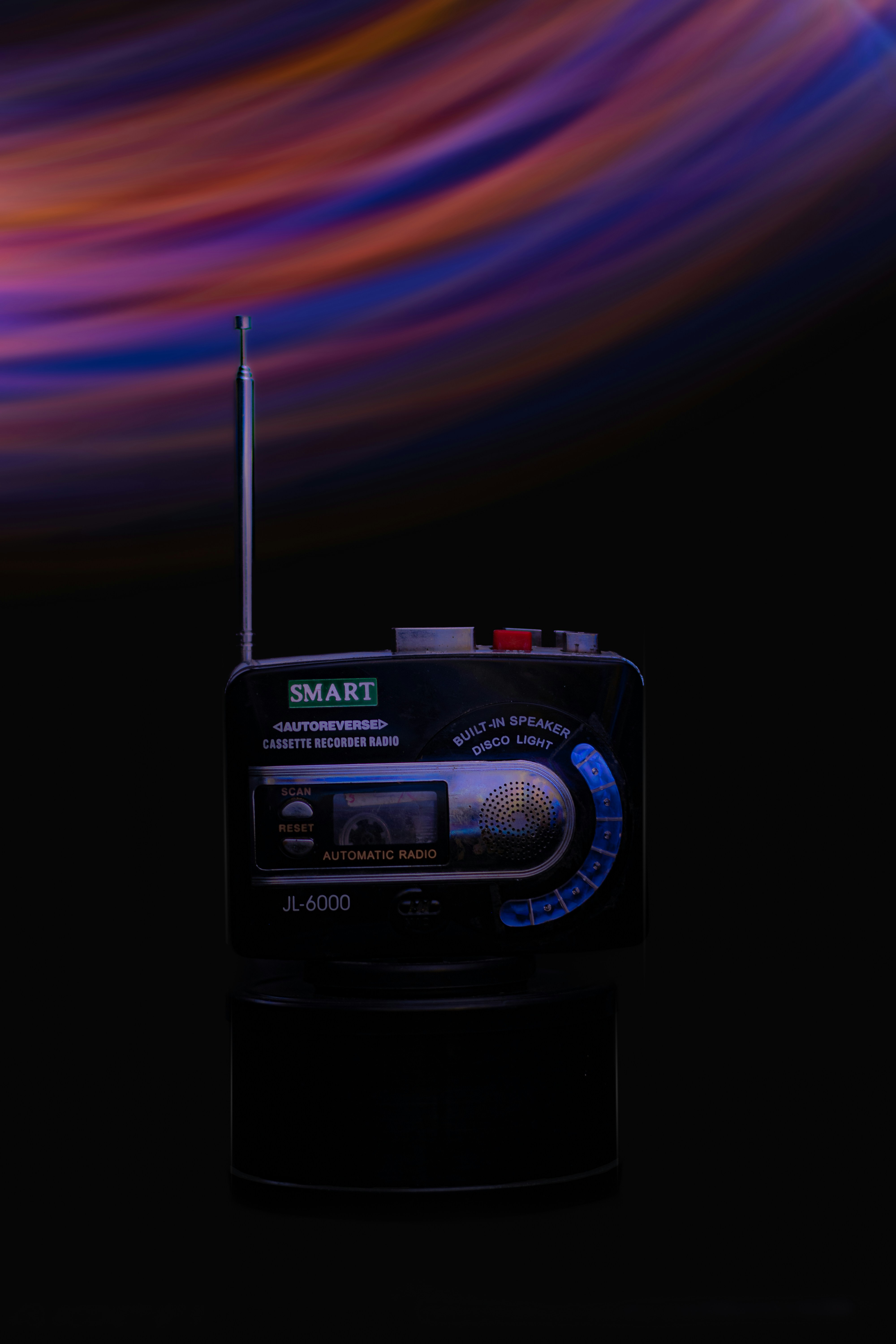 a radio sitting on top of a black table