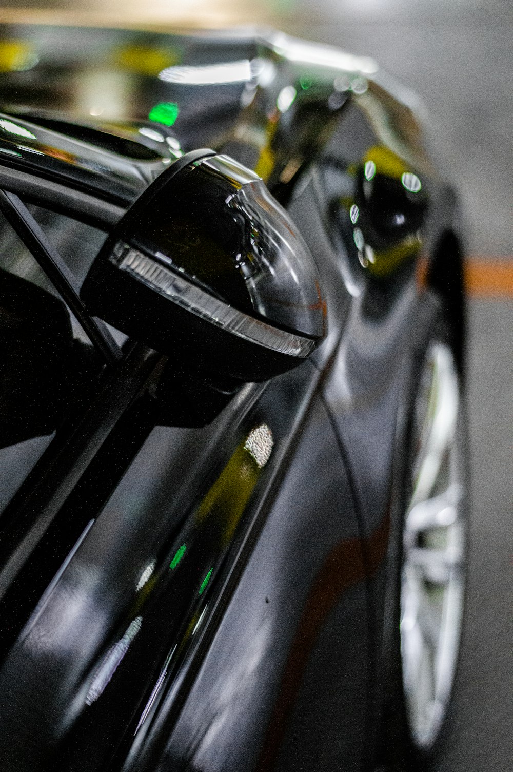 a close up of a car's rear view mirror