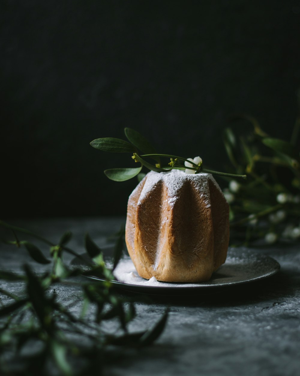 a piece of bread sitting on top of a plate