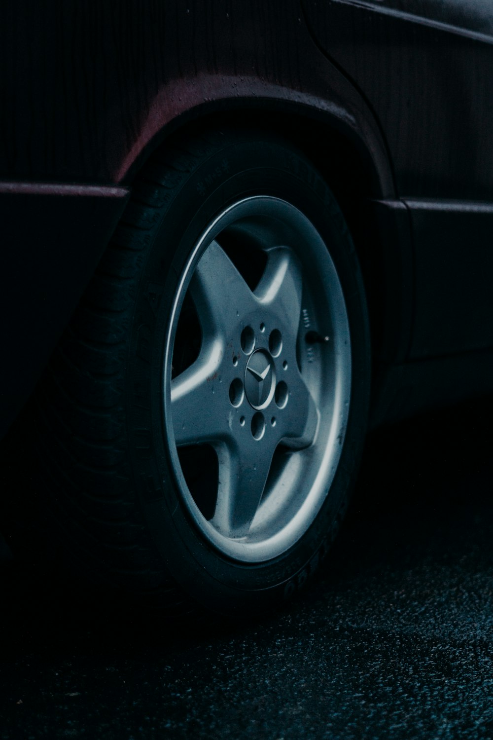 a close up of a tire on a car