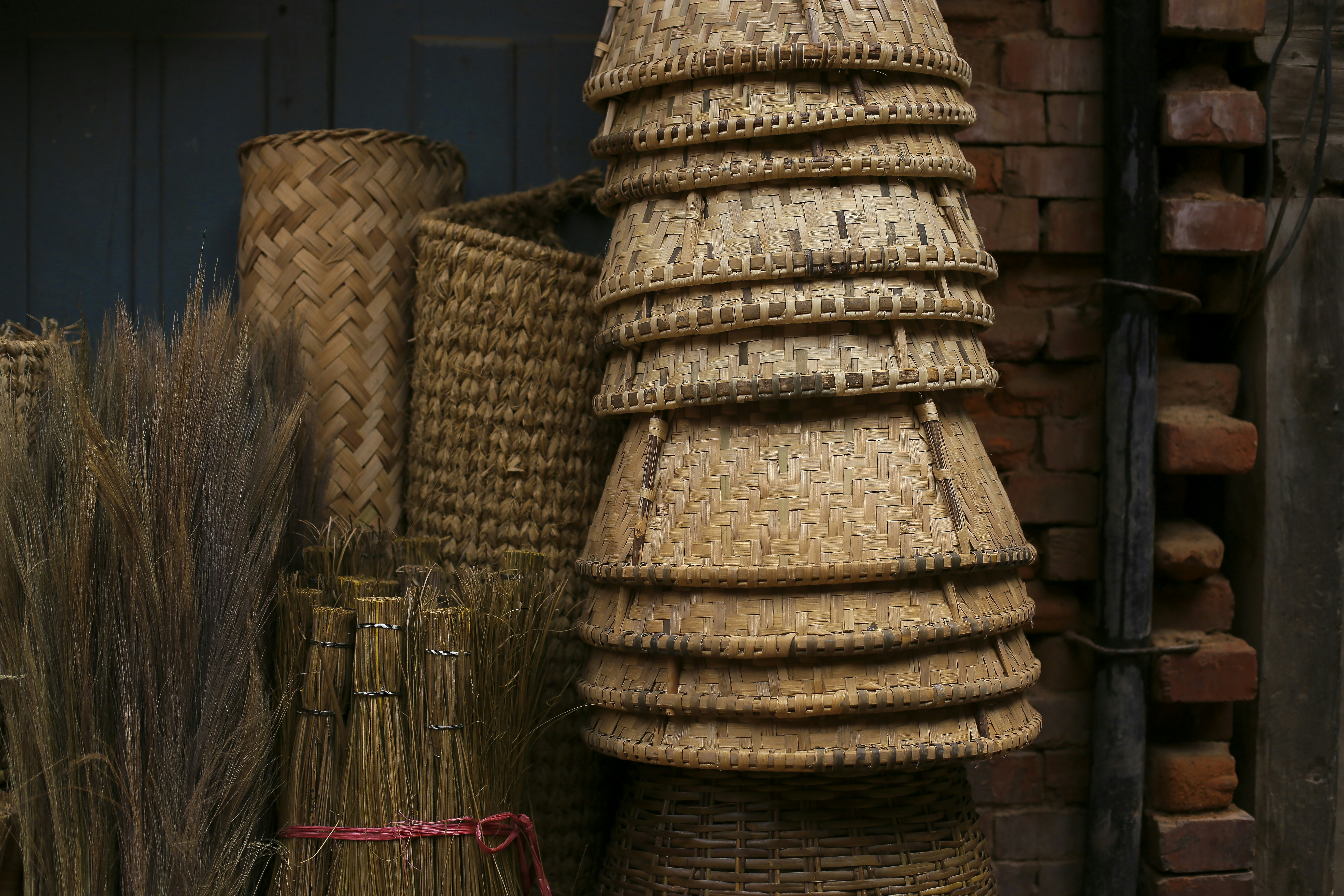 a pile of woven baskets sitting next to each other