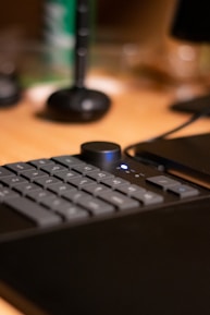 Close-up of a keyboard with 'SEO' highlighted on screen.