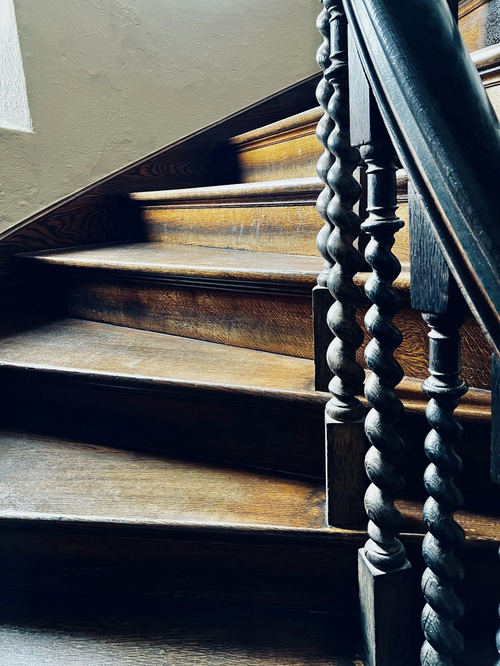 a close up of a wooden stair case