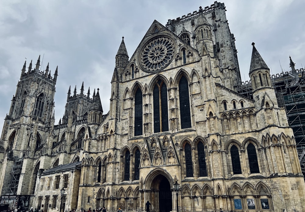 a large cathedral with a clock on the front of it