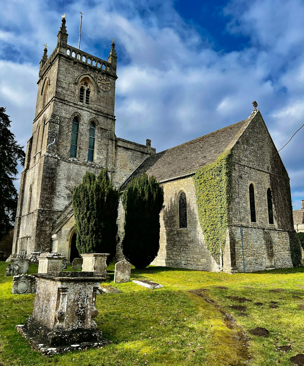 an old stone church with a tall tower