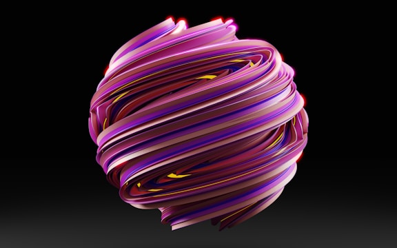 a purple and yellow object with a black background