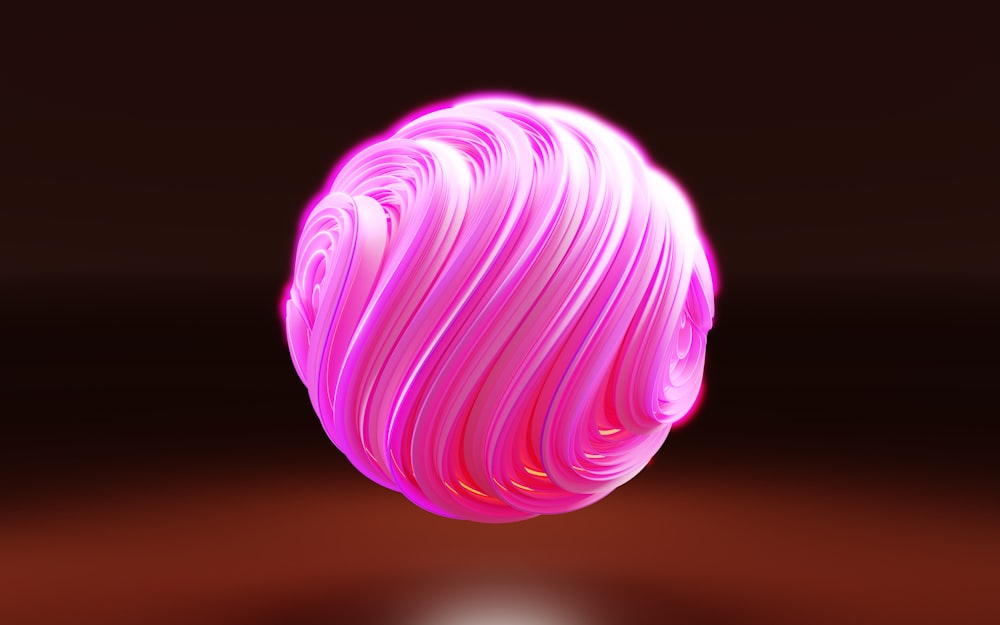 a pink object with a black background