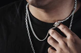 a close up of a person wearing a necklace