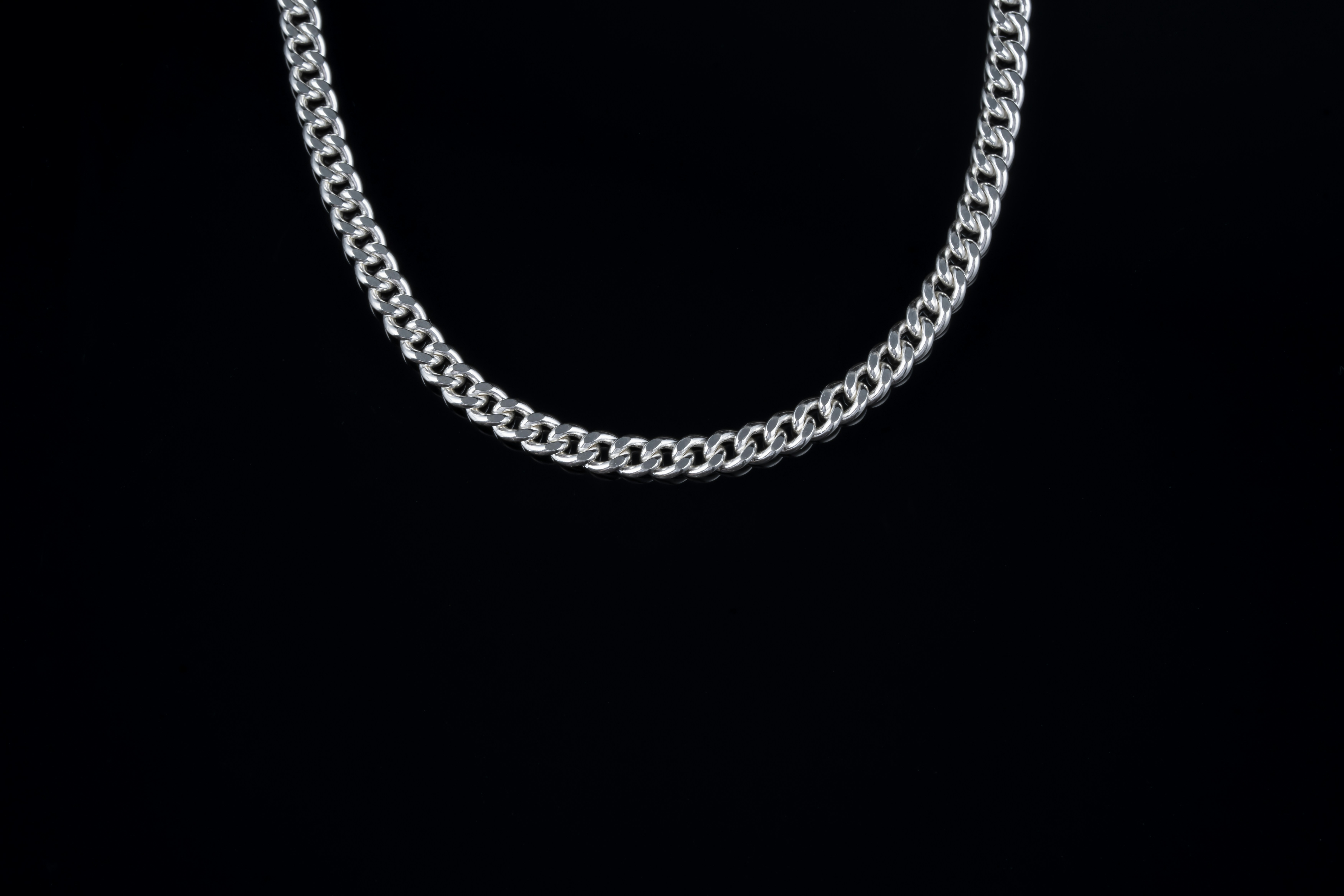 A silver chain on a black background photo – Free Accessories ...