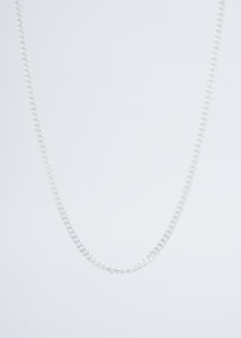 A stylish silver choker necklace displayed on a minimalist white bust.