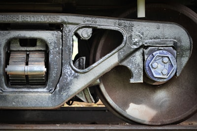 a close up of a train wheel on a train