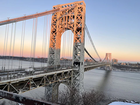 Bridge at sunset with sensor nodes visibly attached along its span