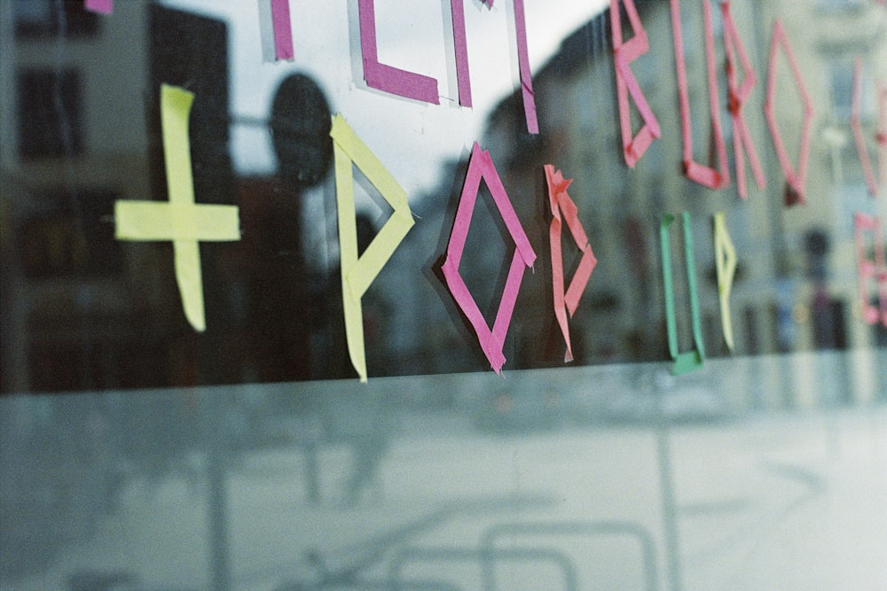 a close up of a window with some writing on it