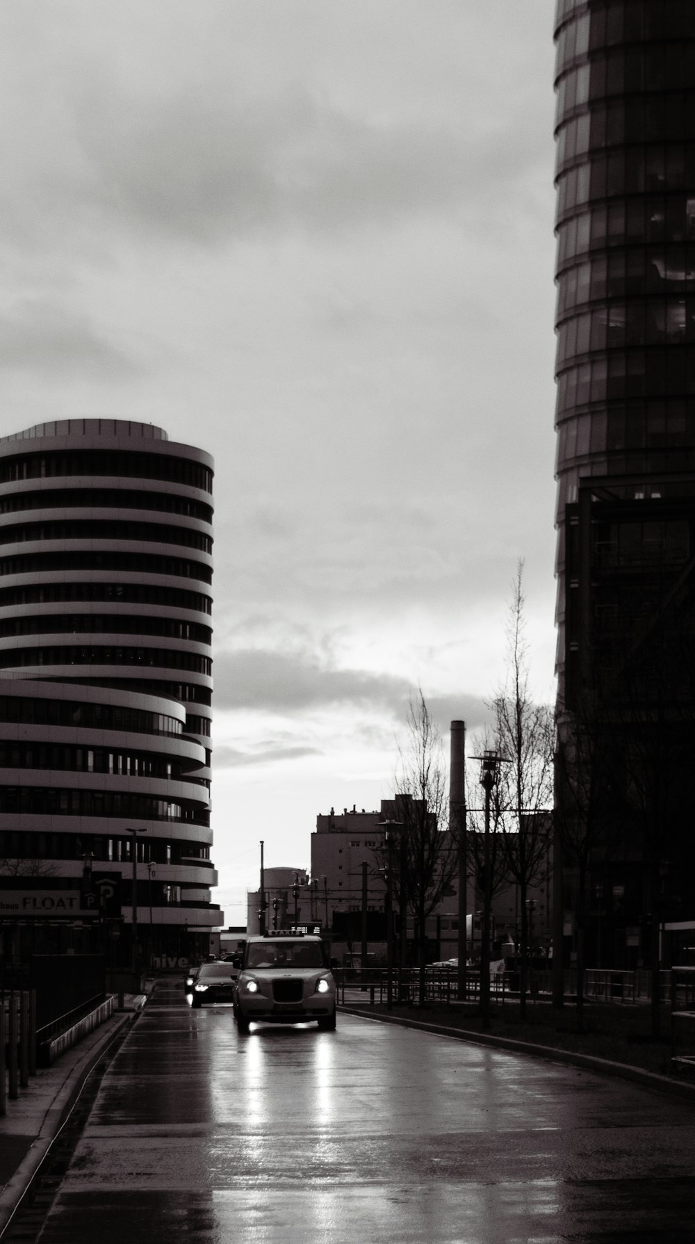 a black and white photo of a city street