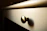 Close-up of a sleek matte acrylic kitchen drawer softly lit to show texture.