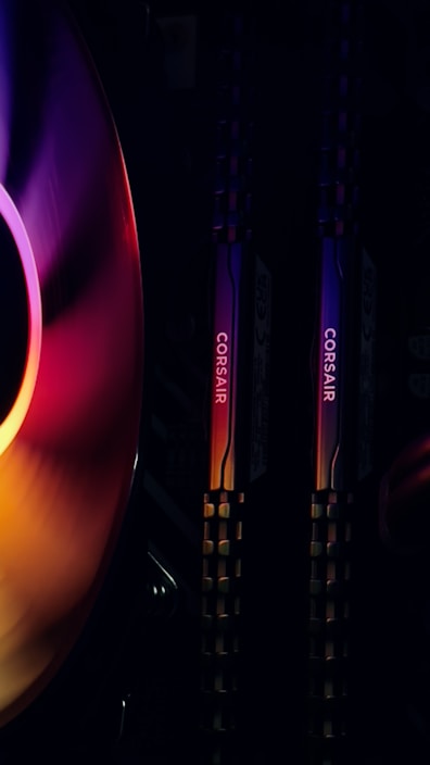 A vibrant display of colorful RAM sticks arranged neatly on a wooden desk