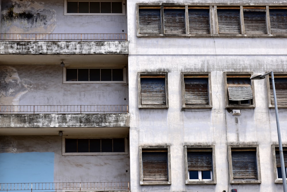 a building with multiple windows and balconies