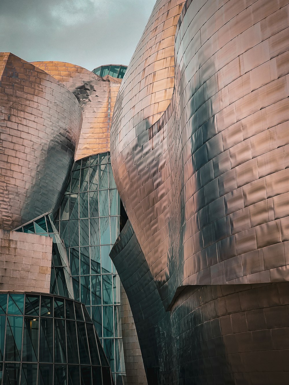 a building that has a bunch of metal structures on it