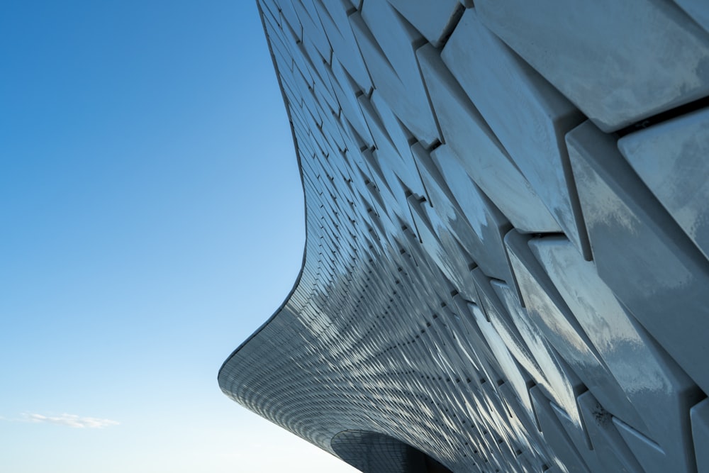 the side of a building with a sky in the background