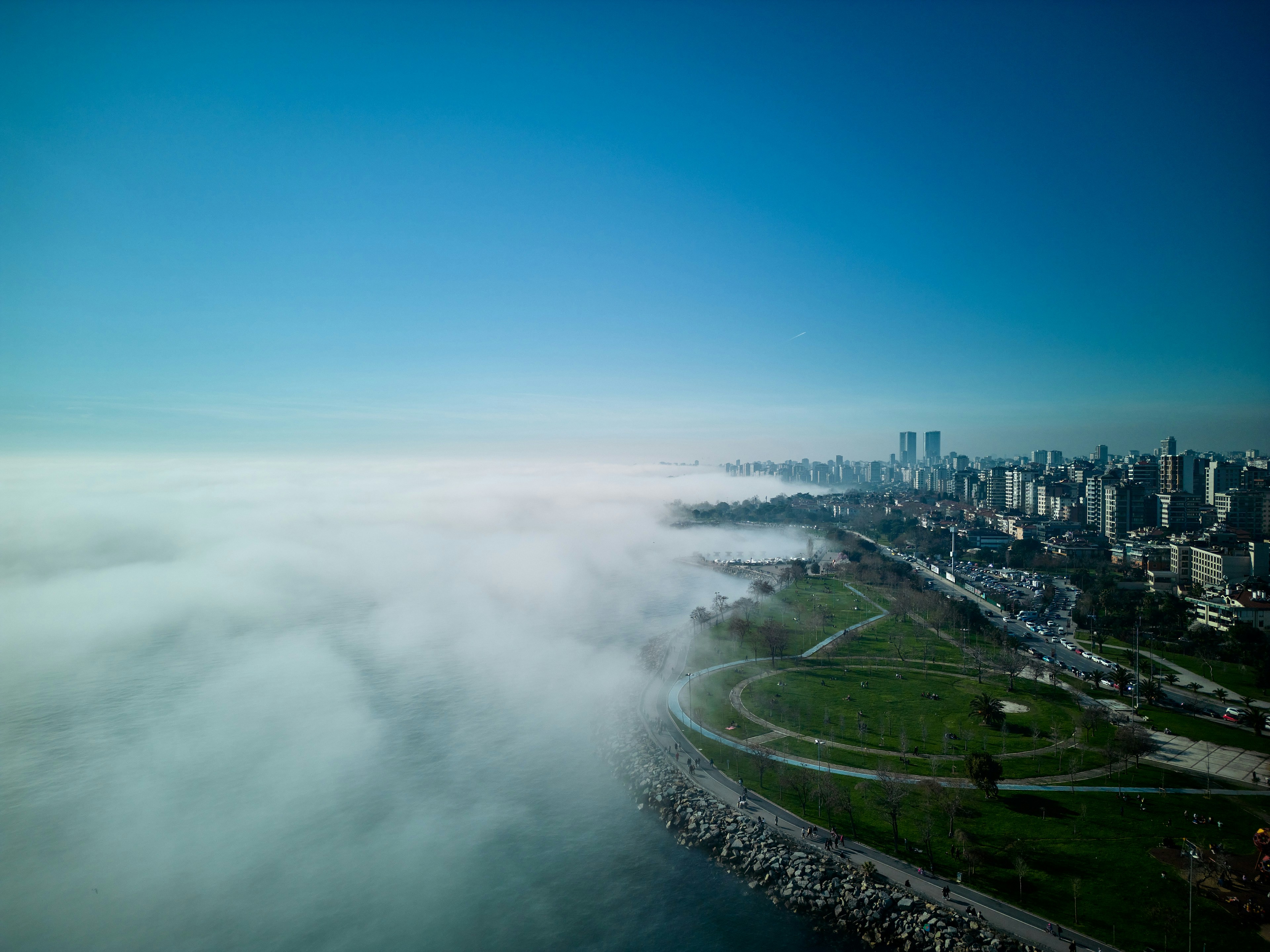 a view of a city from above the clouds