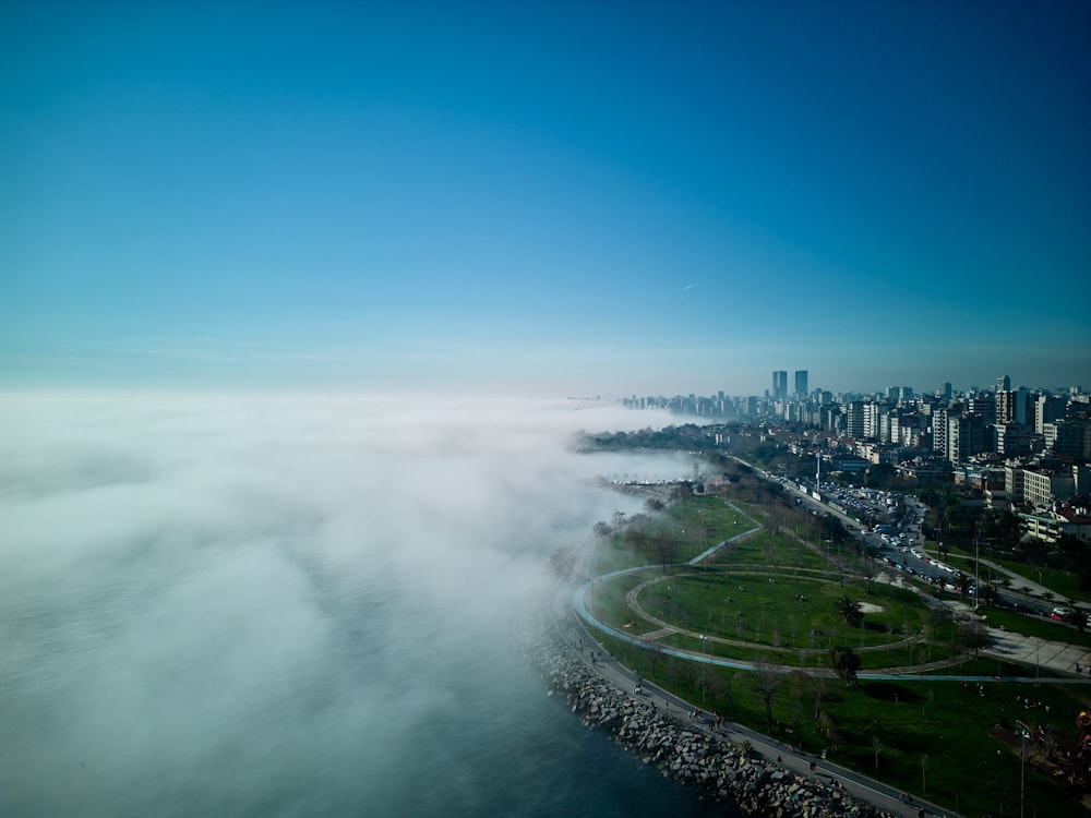 a view of a city from above the clouds