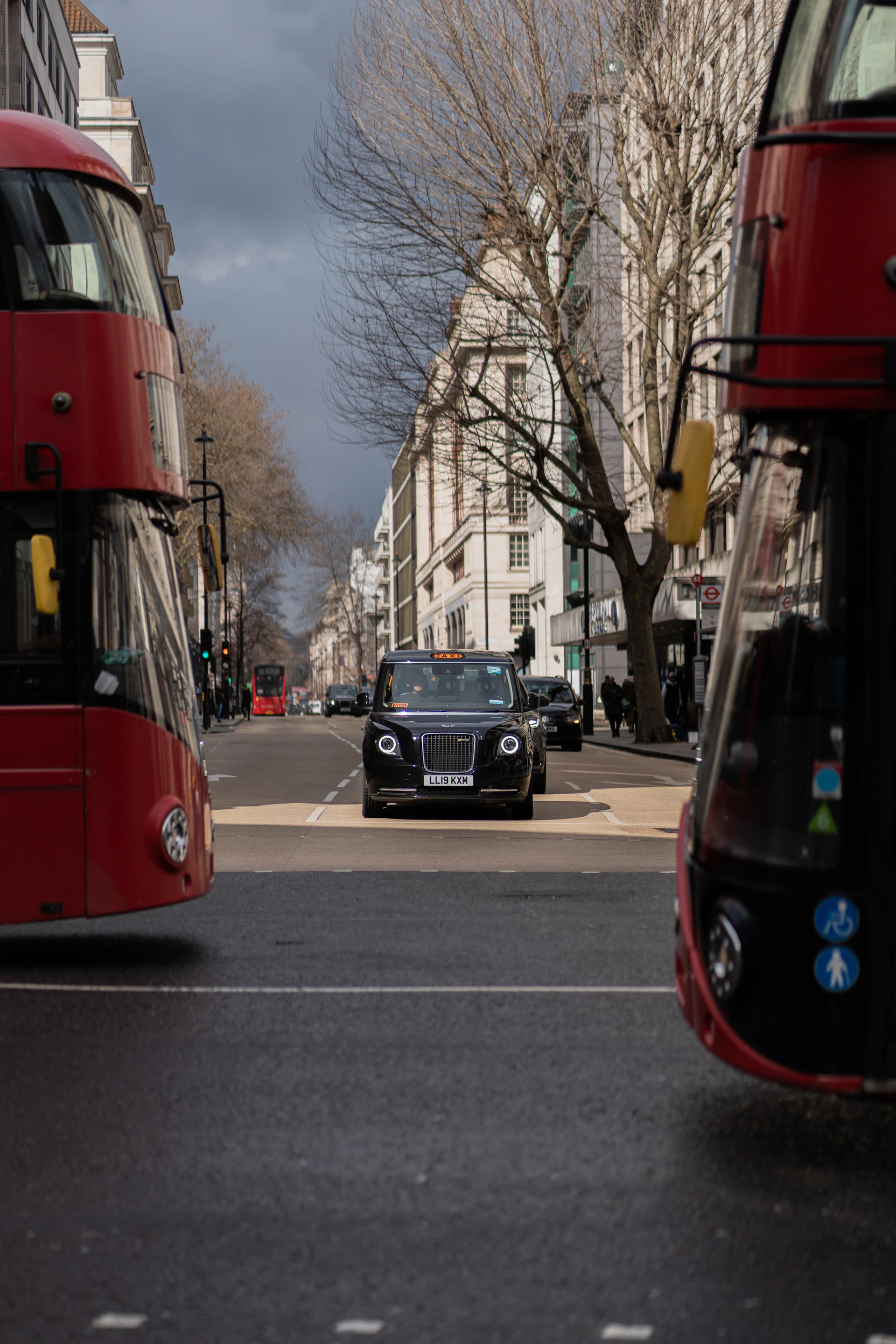 woman wearing yellow long-sleeved dress under white clouds and blue sky during daytime