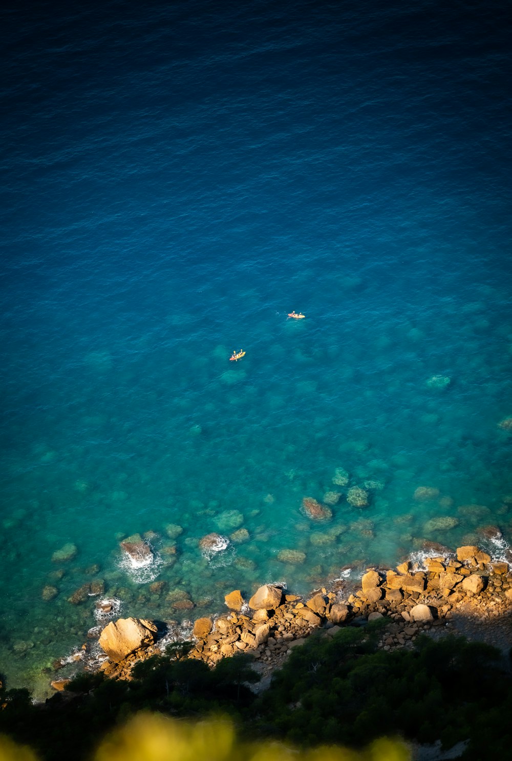 a body of water with two people in it