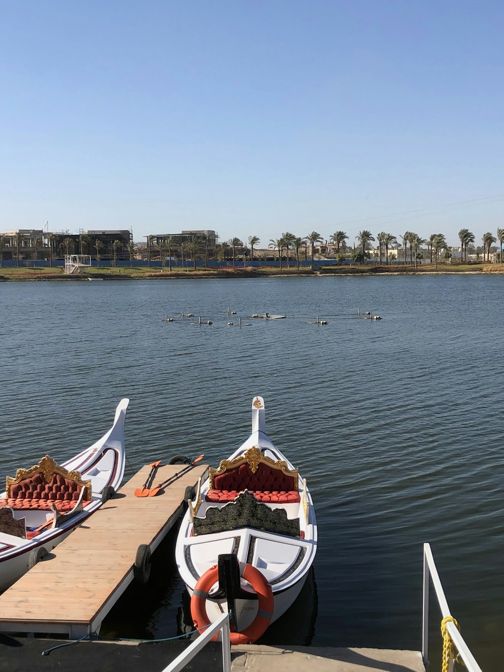 a couple of boats that are sitting in the water