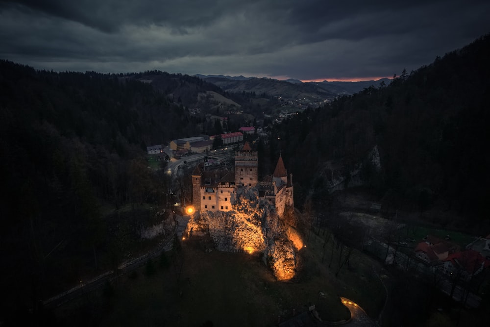 an aerial view of a castle at night