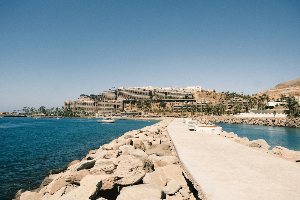 a view of a body of water with a city in the background