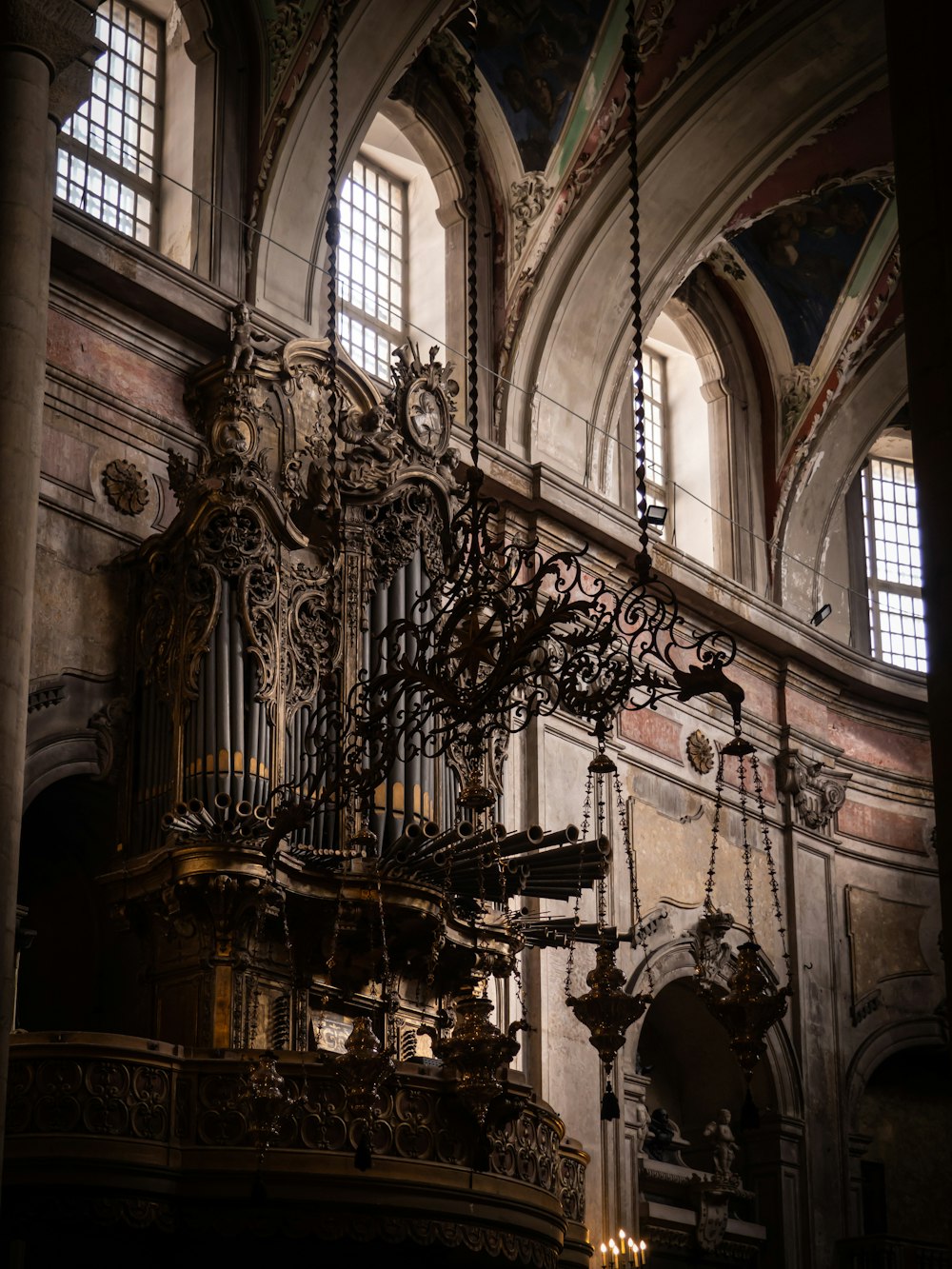 a church with a chandelier hanging from the ceiling
