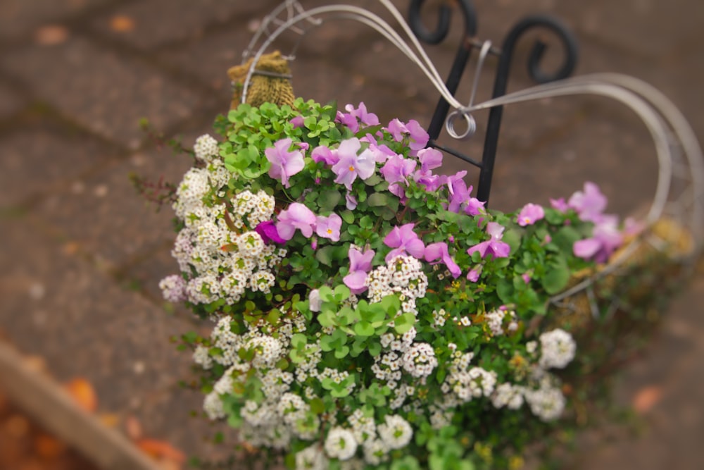 a bunch of flowers that are in a basket