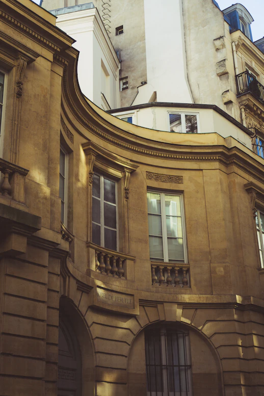 a tall building with a clock on the top of it