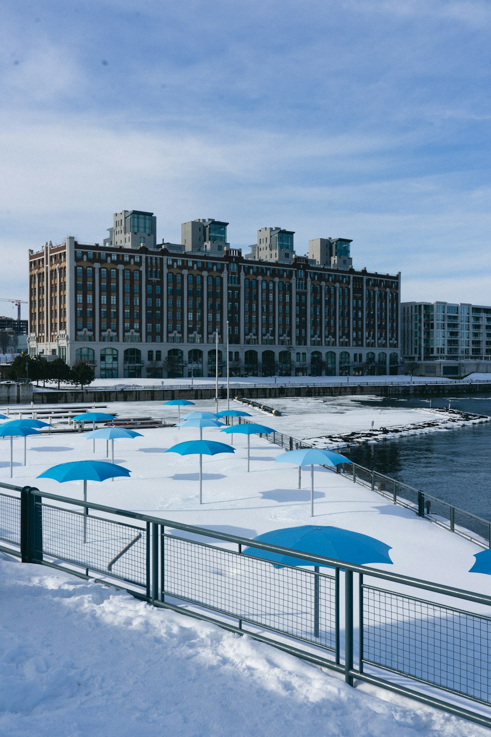 a group of umbrellas that are in the snow