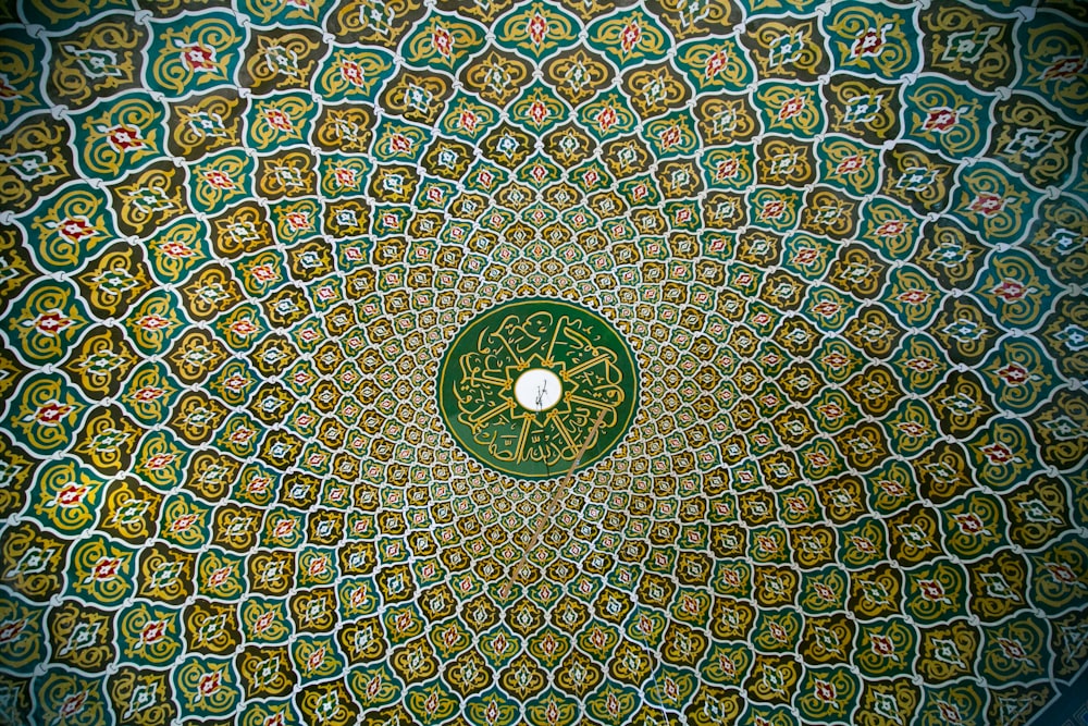 a close up of a decorative ceiling in a building