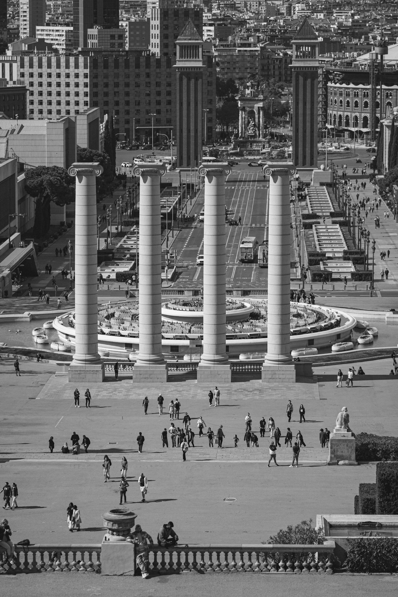 a group of people walking around Plaza de España