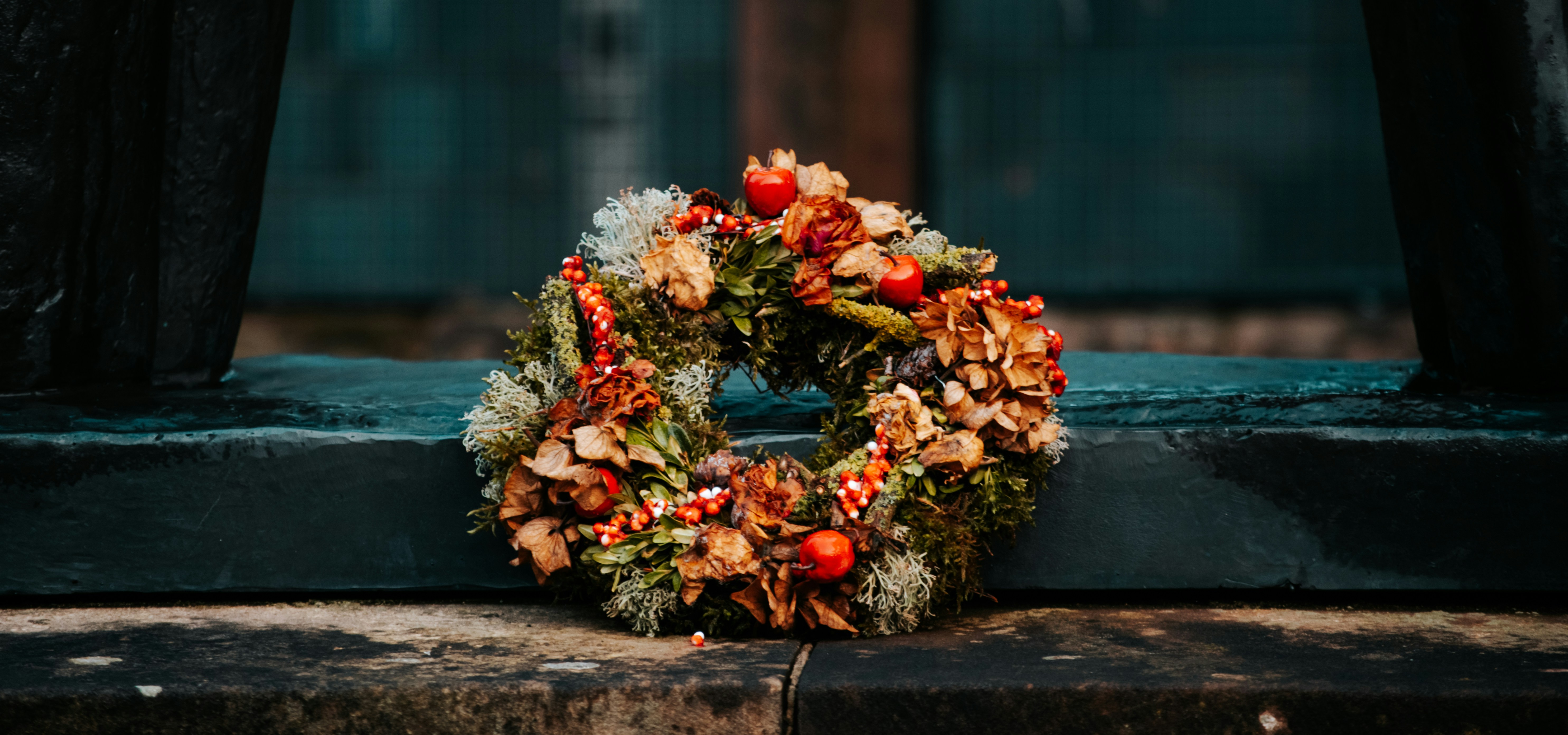 Memorial wreath on building
