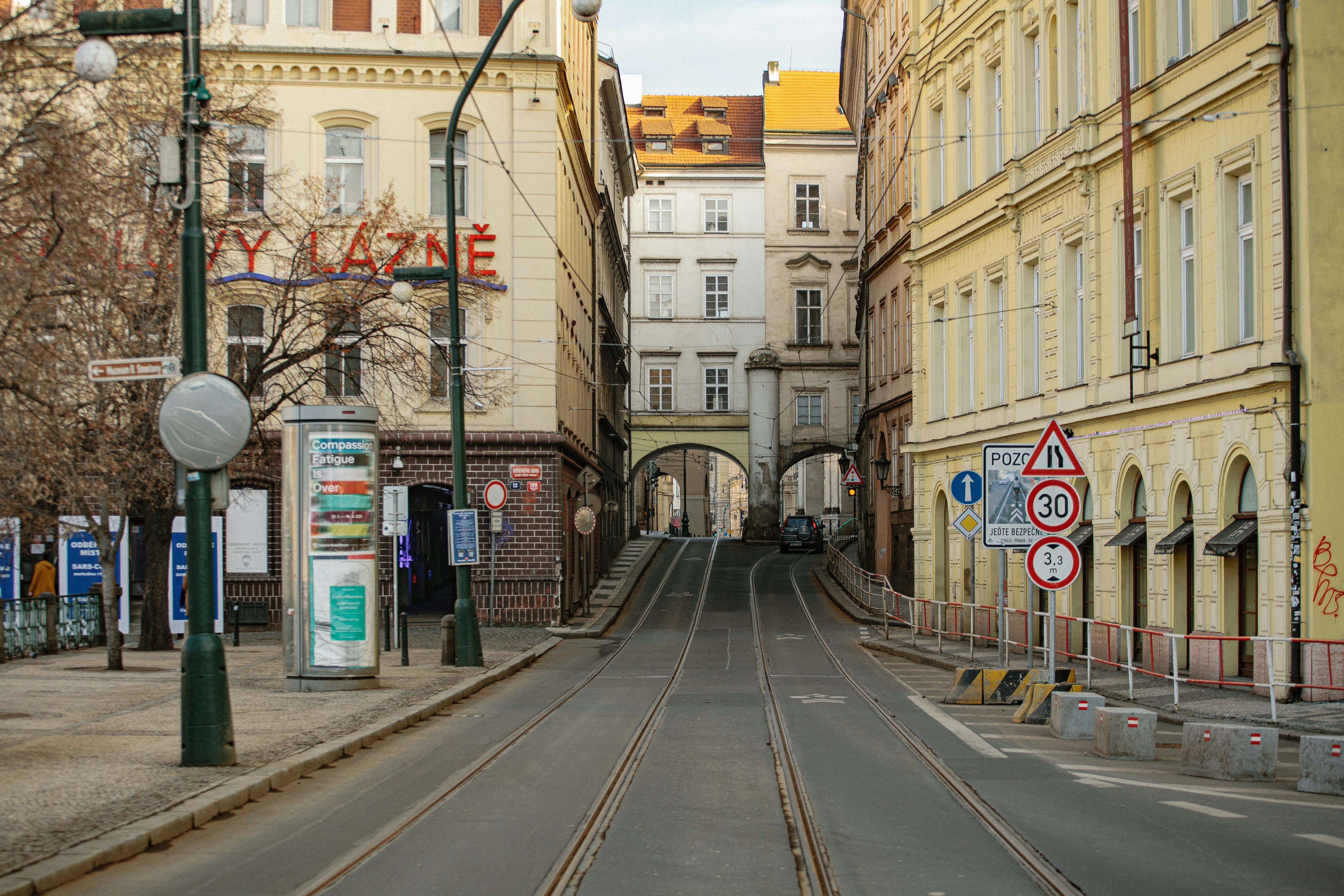 a street with a train track going through it