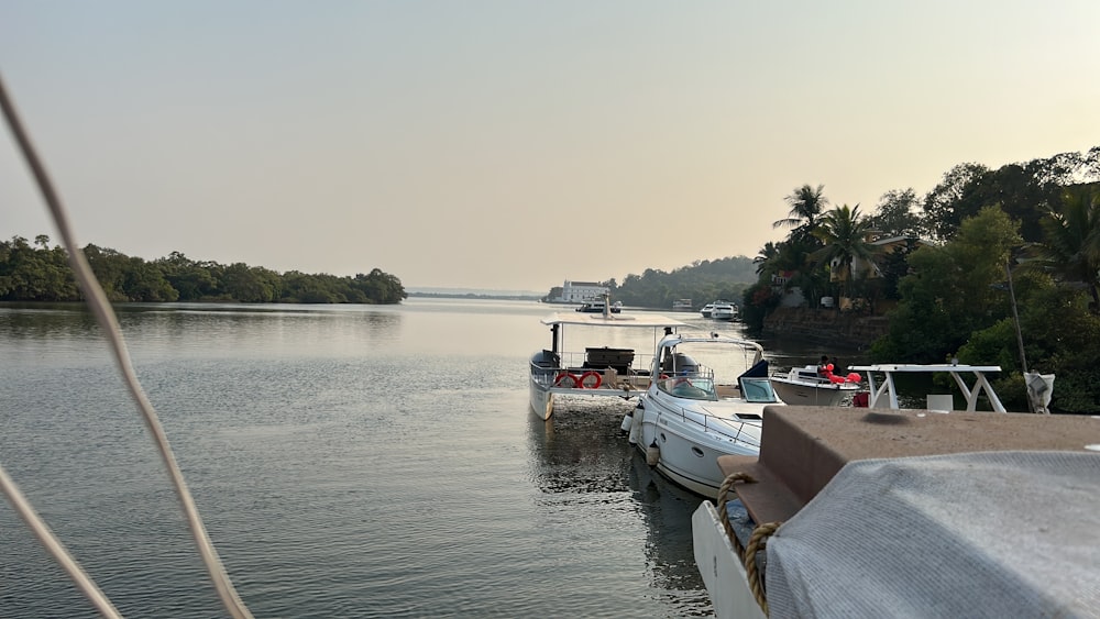 a couple of boats that are sitting in the water