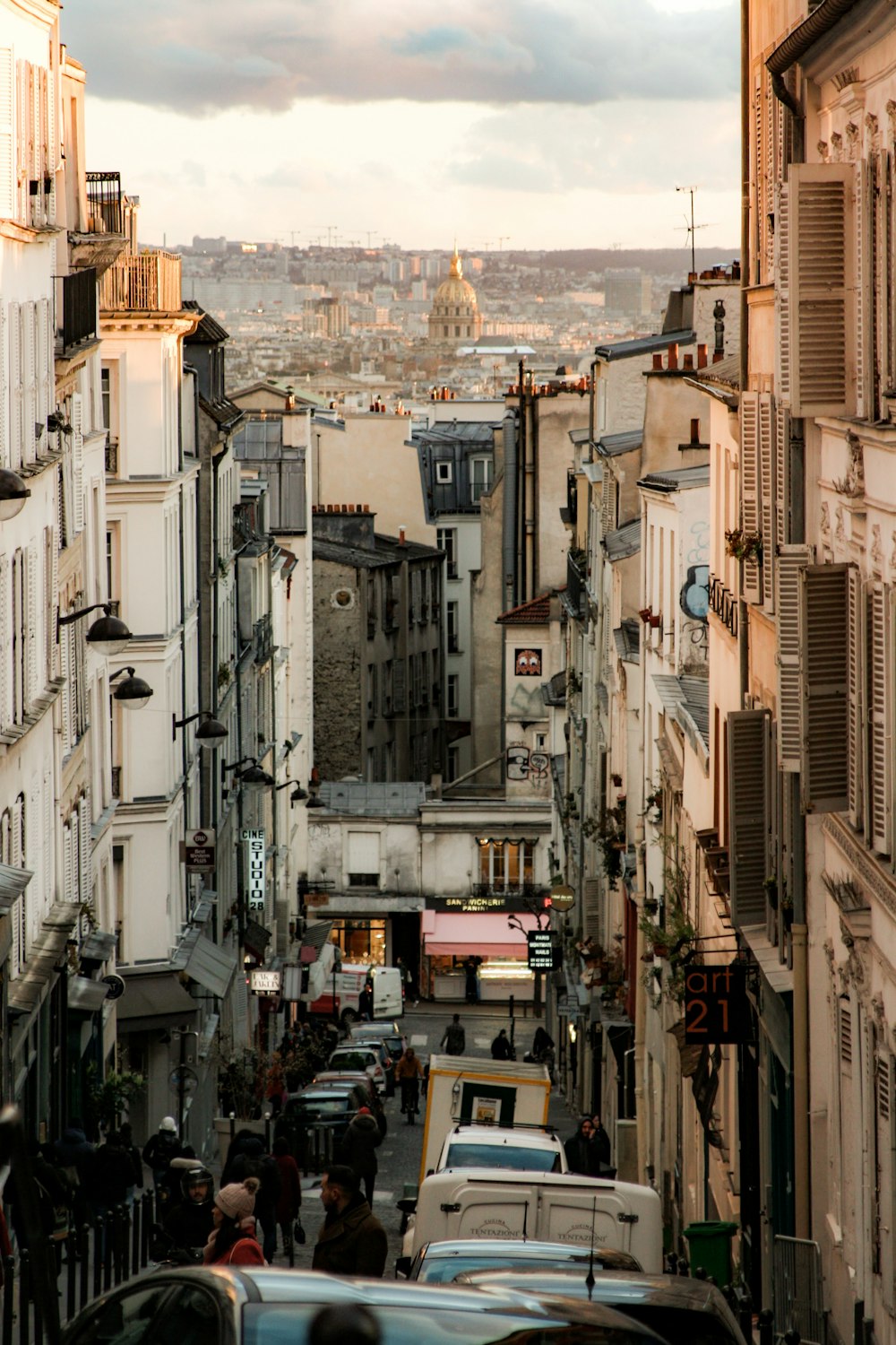 a city street filled with lots of tall buildings